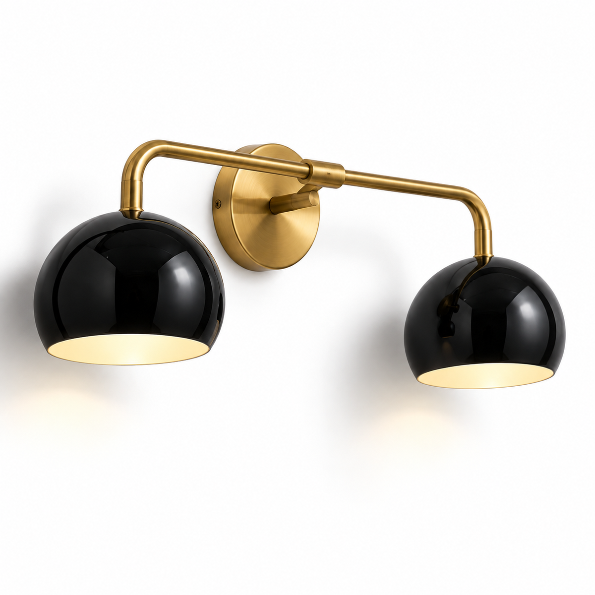 2-light brass wall sconce with black dome shades and round wall mount